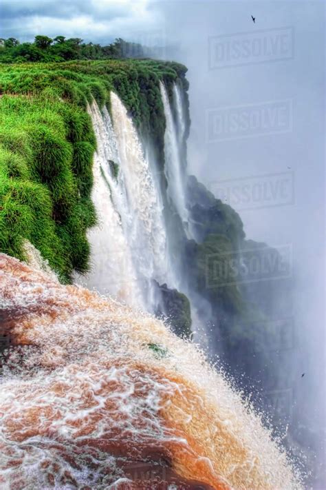 Vertical View Of The Iguazu Falls In South America Stock Photo Dissolve