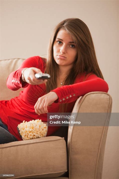Bored Caucasian Woman Watching Television High Res Stock Photo Getty