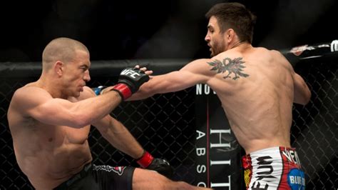 St Pierre Wins Bloody Comeback Fight At Ufc 154