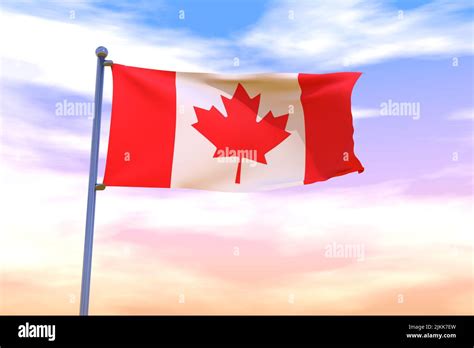Waving Flag Of Canada With Chrome Flag Pole In Blue Sky Waving In The