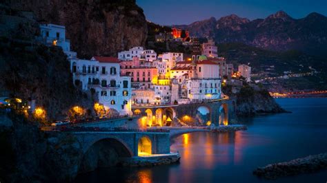 Night View Of Amalfi On Coast Line Of Mediterranean Sea Italy Stock