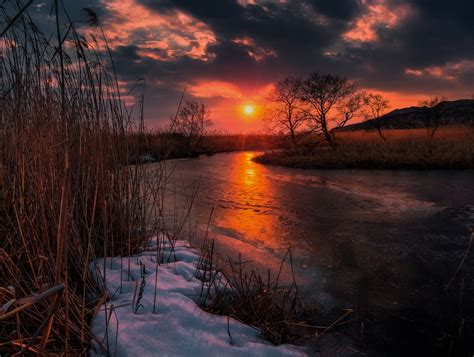 Winter River At Sunset