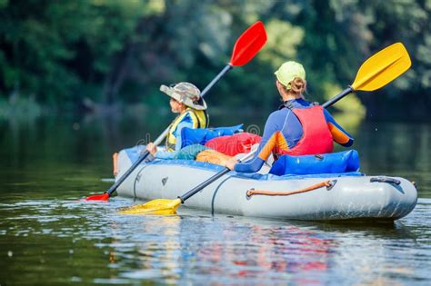 Aerial Drone Bird`s Eye View Photo Of Two Kids Enjoying Kayak Ride On