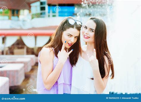 two beautiful girls having fun on the street stock image image of attractive happiness 96056225