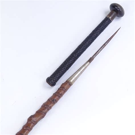 A 19th Century Rootwood Spear Walking Stick With Woven Screw Handle