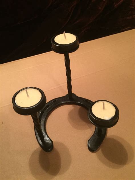 Three Candles Sitting On Top Of Each Other