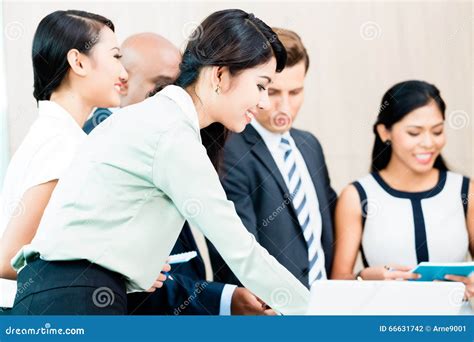 Business Meeting Of Asian And Caucasian Executives Stock Photo Image