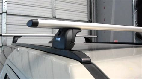 Land Rover Lr3 With Thule 460r Podium Aeroblade Roof Rack By Rack