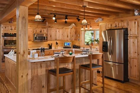 It is open to the living room and dining room. Interior. Great Log Cabin Interior Decorating Ideas ...