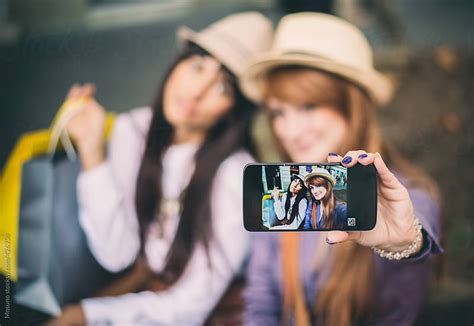 Women Taking Selfie By Mosuno Stocksy United