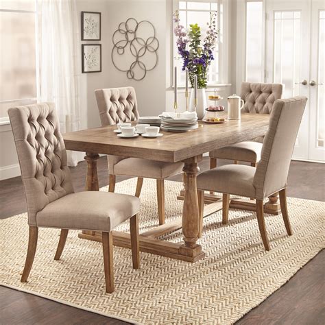 Bright wood finishes not only the table's top, but also the contemporary setup for a spacious, bright dining room with a long, rectangular dining table crafted out of bright birch wood with an unpainted finish. Birch Lane™ Heritage | Wayfair