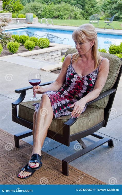 Woman On Patio With Wine Glass Stock Photo Image