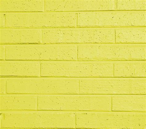Yellowpaintedbrickwall Brick Wallpaper Yellow Brick Wallpaper