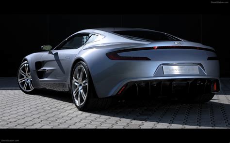 The driver's door swings out and arcs gently upwards, just like it might on a db9 or new vanquish, but the slow, expensively gloopy motion is gone and instead the door zips away from you like a lost helium balloon. Aston Martin One 77 Breaks 220 MPH Record Widescreen ...