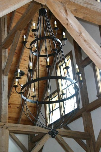 Vaulted ceilings require a lot of planning and calculations to make sure the walls can support the roof load without the ceiling beams. Chandelier Lighting. www.fiddlinfrogs.com Vaulted ceiling ...