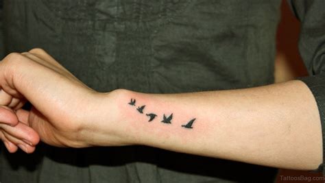 56 Charming Birds Tattoos For Wrist Tattoo Designs