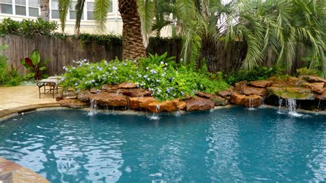 Considering A Pool Waterfall Pros Cons Ideas And Cost
