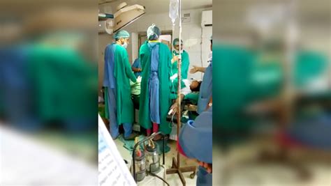 doctors found fighting in operation theater leading to new born death caught on camera