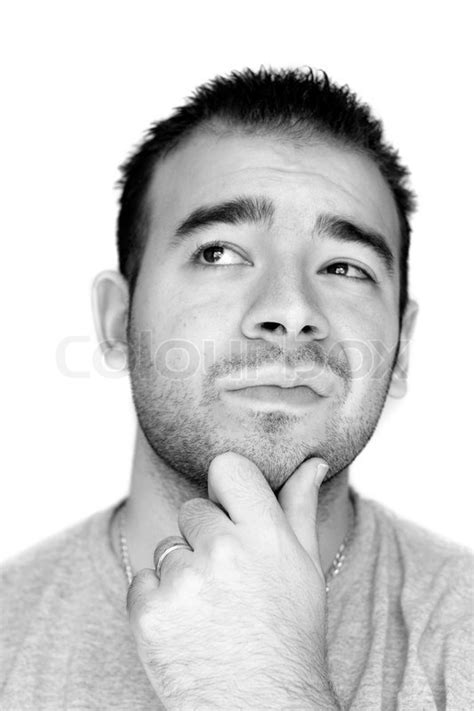 A Young Man With His Hand On His Chin Stock Image Colourbox