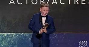Jude Hill accepts his best young actor award at the 27th Annual Critics Choice Awards