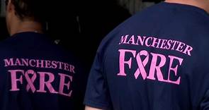 Manchester firefighters wear T-shirts raising awareness of breast cancer