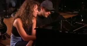 Mariah Carey and Walter Afanasieff composing a song together.