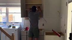 Part 4 of our laundry room remodel! The RTA Cabinets are in and it’s time to DIY the bathroom wallpaper! #DIY #rtacabinets #laundryroom #home #remodel #rta #cabinets | Nik and Liv DIY