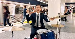 Joseph Gordon-Levitt plays the drums in a subway