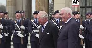 Britain’s King Charles welcomed at Brandenburg Gate