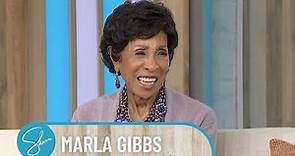 Sherri Gives Legend Marla Gibbs Her Flowers