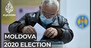 Moldovans vote in presidential election under Moscow's gaze