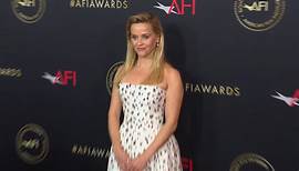 Reese Witherspoon proudly poses at the 2024 AFI Awards Luncheon