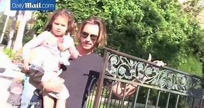 Gabriel Aubry carries daughter Nahla on his hip back in 2012