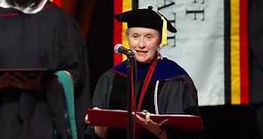 Dr. Christine Grady Hooded by Husband Dr. Anthony Fauci After Receiving Honorary Degree at UMB