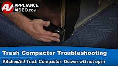 Trash compactor - Drawer will not open , stuck in closed position