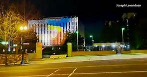 Ukrainian flags projected onto Russian Embassy in U.S.