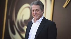 Hugh Grant says he took 'enormous sum' to settle suit alleging illegal snooping by The Sun tabloid