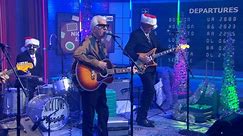 Saturday Sessions: Nick Lowe and Los Straitjackets perform "Christmas at the Airport"