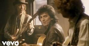The Traveling Wilburys - End Of The Line (Official Video)