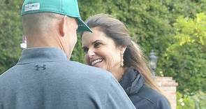 Loved up! Maria Shriver goes for a stroll with Matthew Dowd