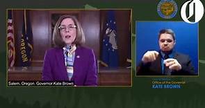 Gov. Kate Brown speaks to the media