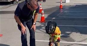 Tiny firefighter shows off impressive strength