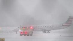 Plane slides off runway at New York airport