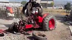 destroy the tractor in the scrap yard