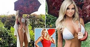 Baywatch's Donna D'Errico, 53, wows in a bikini as she poses with Italian umbrella