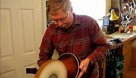 Jim Hilburn buffing mandolin #62