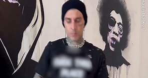 Travis Barker hits the drums after getting his new tattoo