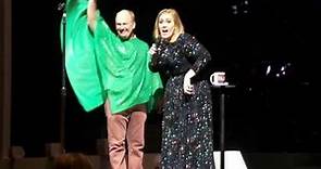 Adele brings dog onstage
