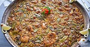 Paella valenciana, la receta tradicional de uno de los platos más reconocidos del mundo.