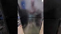 Frigidaire refrigerator with top freezer